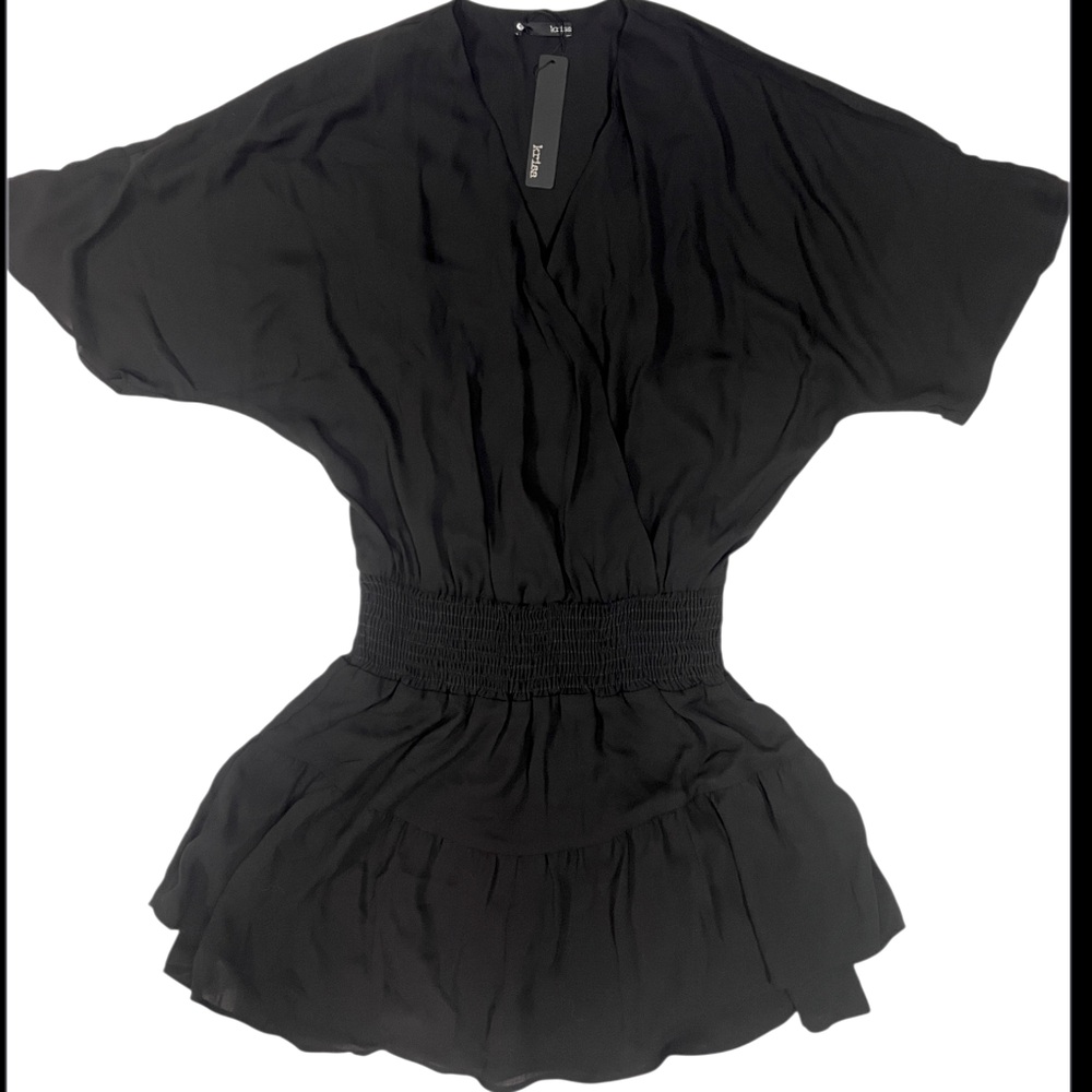 New with tag Krisa dress.  Size small.